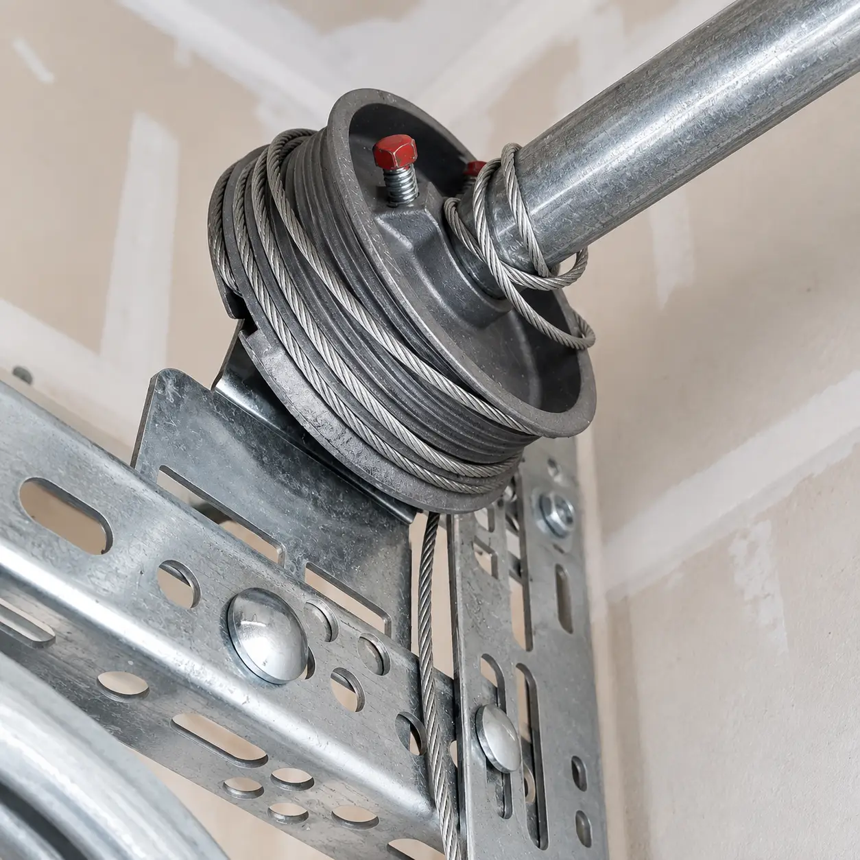 Garage door cable drum, lift cable, torsion shaft, and bottom fixture hardware